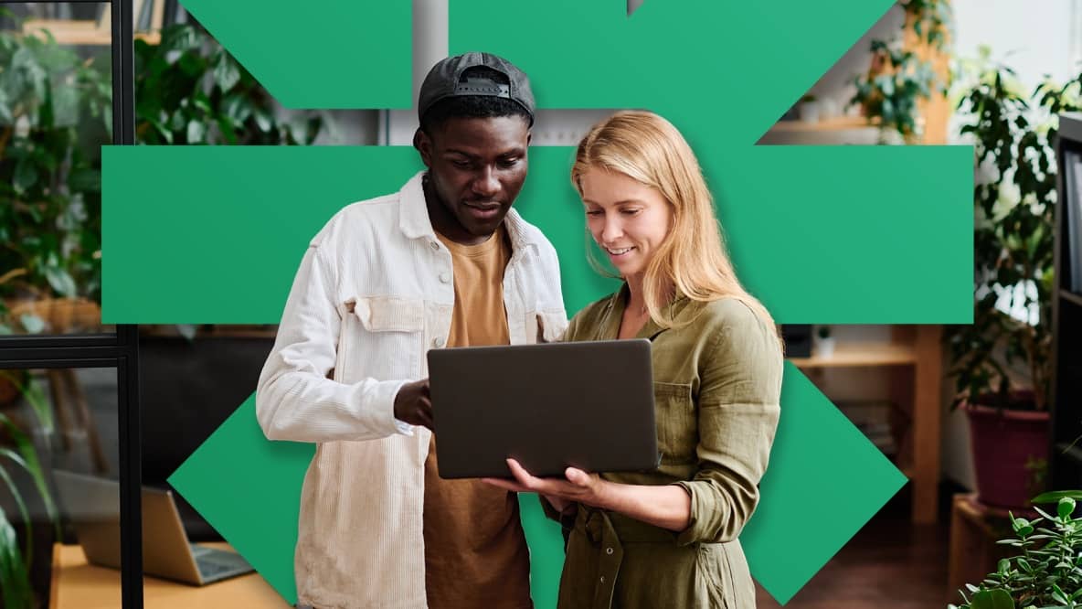 People looking at laptop